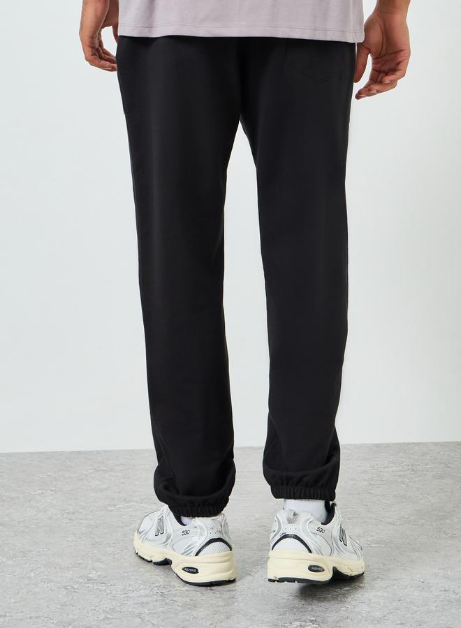 Styli Men Relaxed Fleece Embroidered Joggers - Image 4